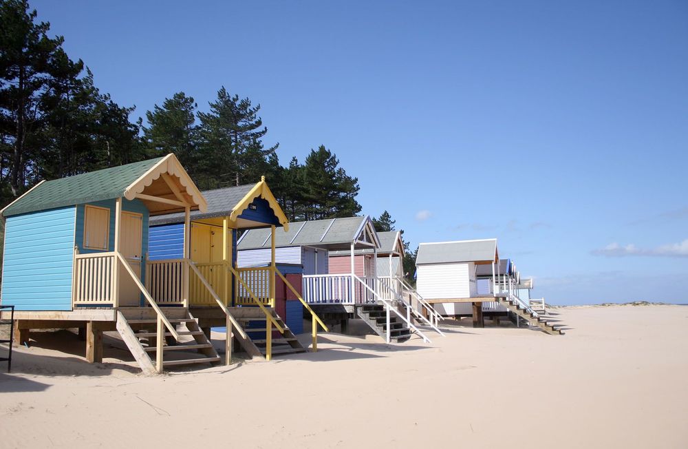 large_beach-huts-wellsnext-sea-on-norfolk-shutterstock_73054087_4cf06664cc-1